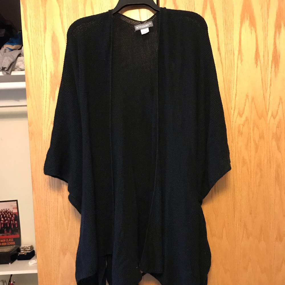 Black cardigan sweater.